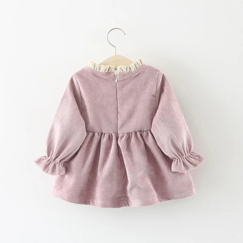 Close-up of the organic cotton fabric on the Large Bow Cozy Dress
