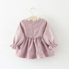Close-up of the organic cotton fabric on the Large Bow Cozy Dress