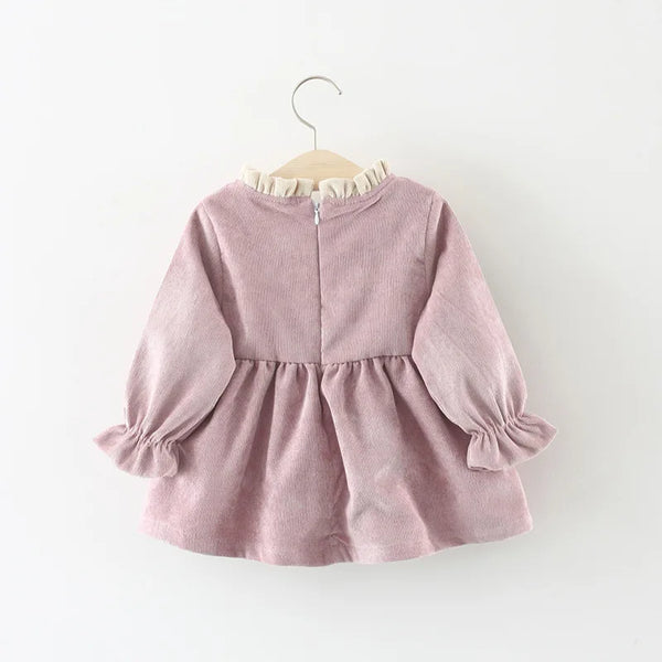 Close-up of the organic cotton fabric on the Large Bow Cozy Dress