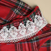 Close-up of the plaid pattern on the Christmas Flare Dress fabric