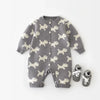 Close-up detail of the Knitted Puppy Dog Jumpsuit knit cotton fabric