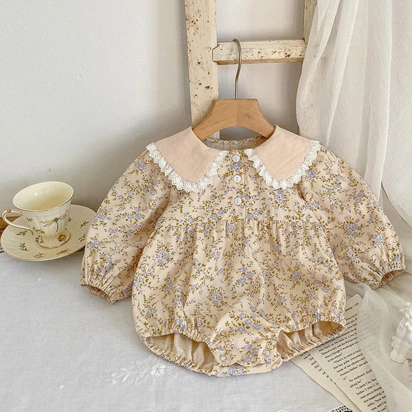 Close-up of the Paisley Lapel Romper fabric and paisley print