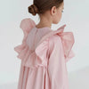 Pink dress with ruffled sleeves on a white background