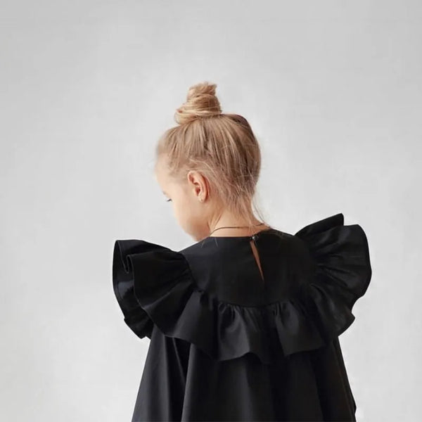 Flying Sleeve Ruffle Dress styled as a gift-ready outfit for kids