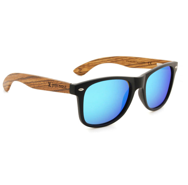 Zebu wooden sunglasses by Joycoast in ice blue lens — angled lifestyle view showing frame construction