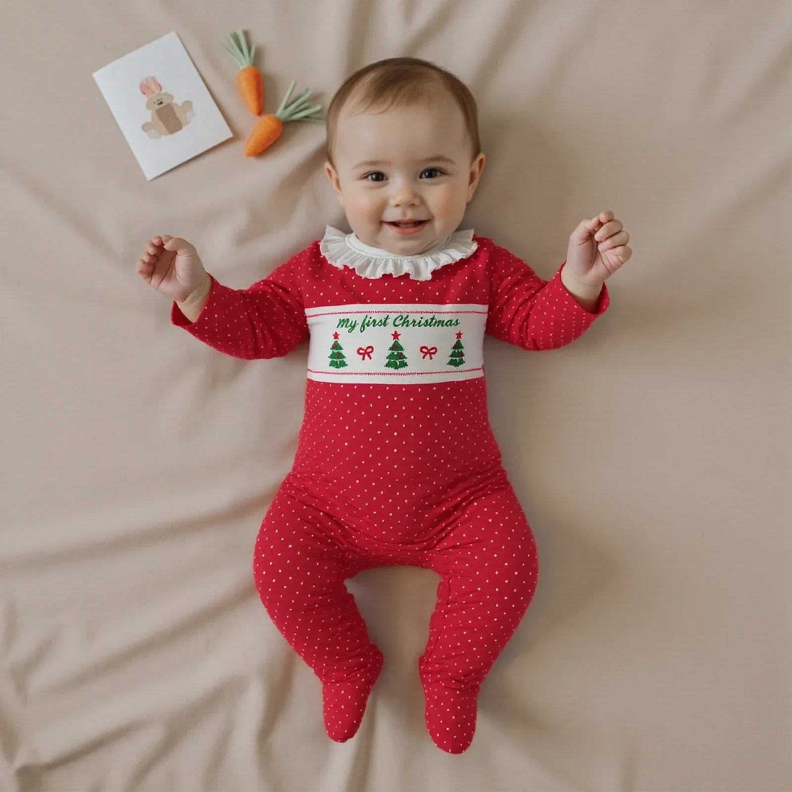 Baby wearing the Polka Dot Christmas Tree Romper