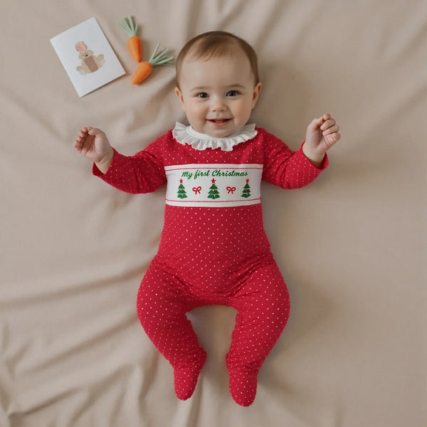 Baby wearing the Polka Dot Christmas Tree Romper