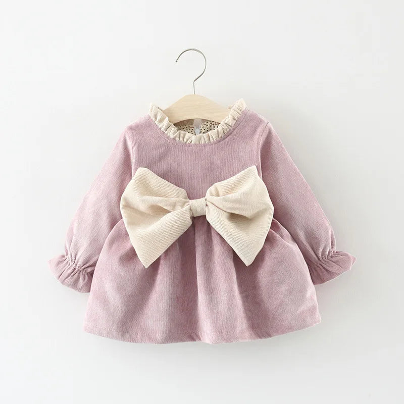 Front view of the Large Bow Cozy Dress with large bow detail