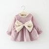 Front view of the Large Bow Cozy Dress with large bow detail