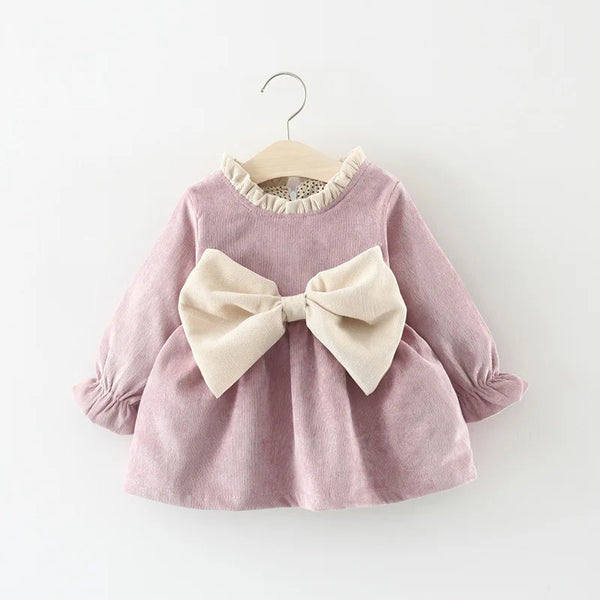 Front view of the Large Bow Cozy Dress with large bow detail