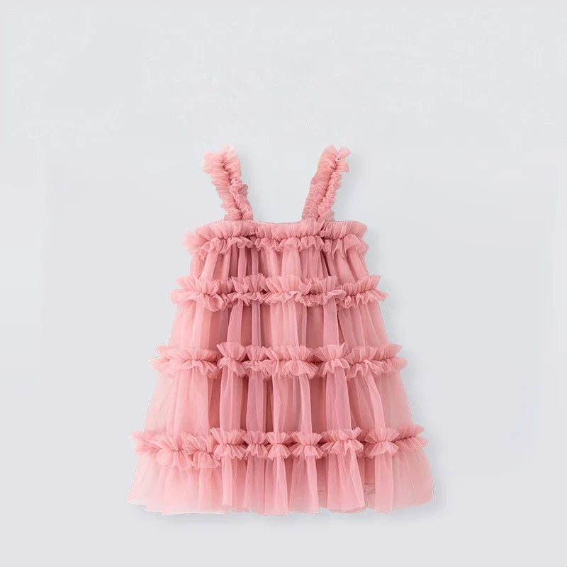 Pink ruffled dress on a light gray background