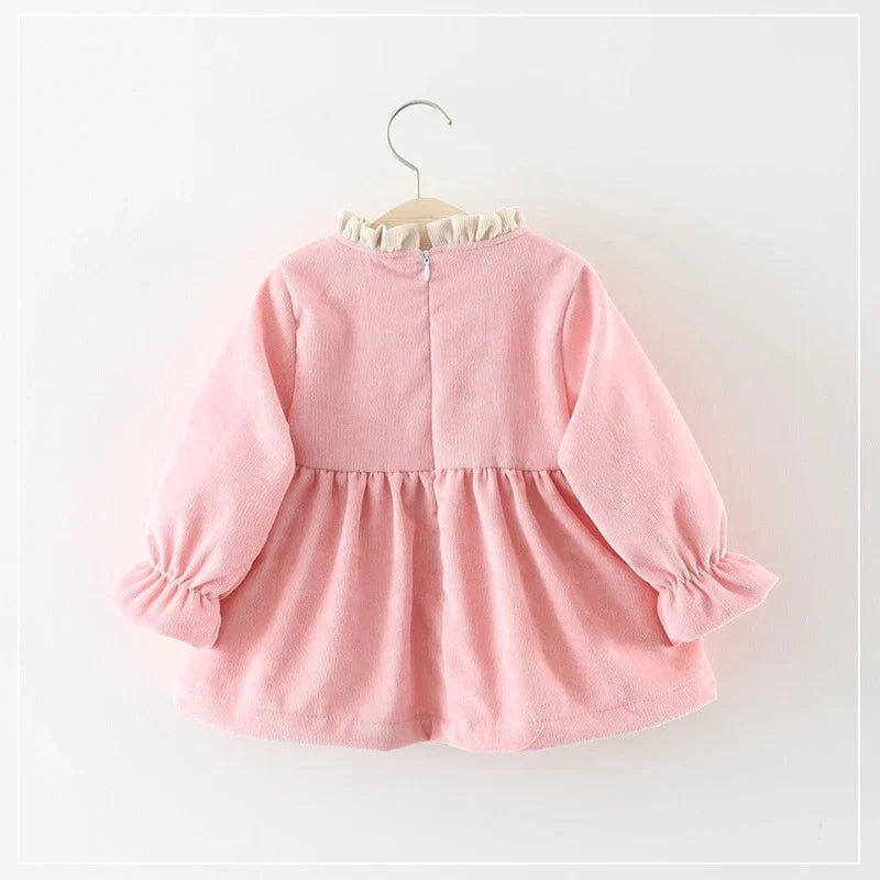 Large Bow Cozy Dress styled on a child
