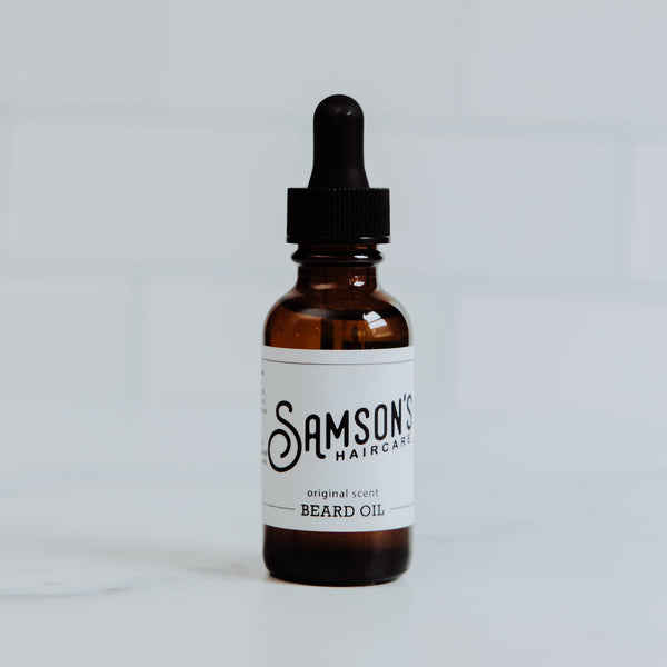 Bottle of Samson's Hair & Beard Oil on a white background
