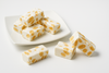 Side view of Andy Anand sugar-free almond torrone brittle box showing 18 bite-size pieces, stevia-sweetened and diabetic-friendly