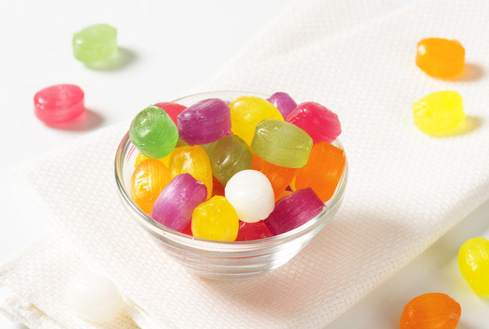 Individually wrapped Andy Anand sugar free herbal hard candies in assorted flavours