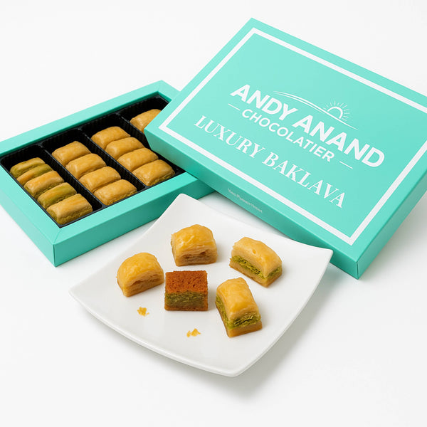 Andy Anand Luxury Baklava with open box on a white background. Sugar-free Turkish baklava, gourmet diabetic-friendly gifts, sugar-free nut pastry box, assorted pistachio baklava, handmade sugar-free sweets, healthy Turkish desserts, Maltitol sweetened baklava, premium nuts snack box, artisan sugar-free baklava gift tin, low sugar Mediterranean pastry.