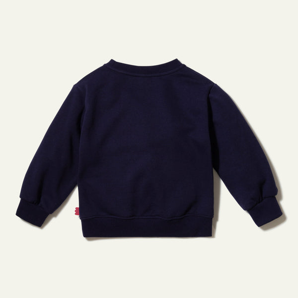Close-up of Mon Coeur Cotton Flower Kids Sweatshirt showing ribbed cuff and recycled fabric detail