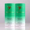 Two green 'Freedom' deodorant sticks on a light gray background