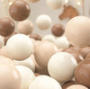 Tiny Land 200-piece BPA-free ocean ball pit balls in white, milk-tea and brown varied colors on neutral background