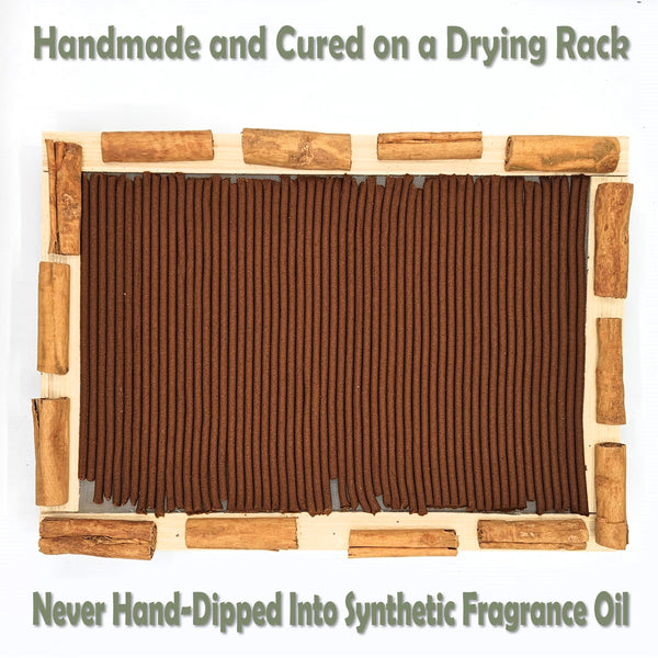 Cinnamon sticks on a drying rack with text about their curing process.