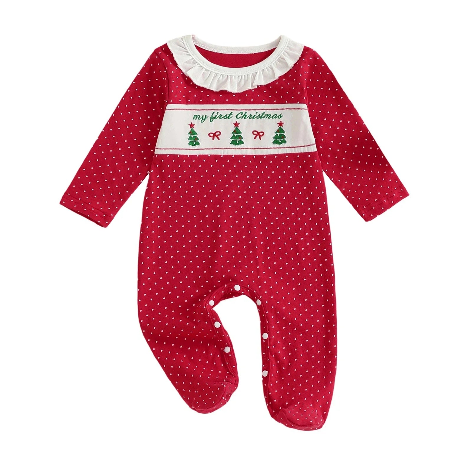Close-up of the polka dot and Christmas tree print on the organic cotton romper