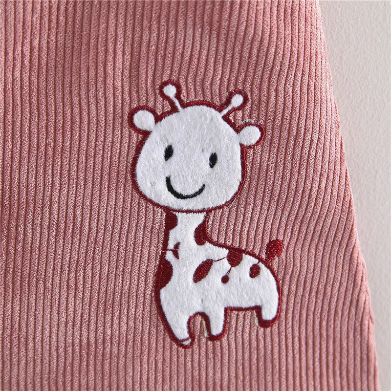 Close-up detail of the organic cotton fabric on the Corduroy Suspender Dress Top Set