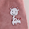Close-up detail of the organic cotton fabric on the Corduroy Suspender Dress Top Set