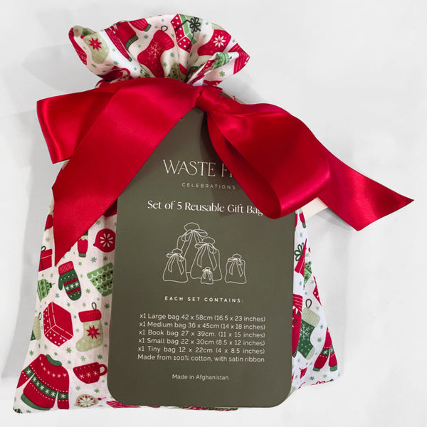 Set of 5 reusable gift bags with festive design and red satin ribbon on a white background