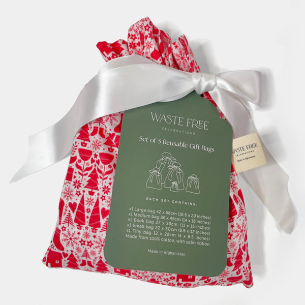 Set of 5 reusable gift bags with red and white pattern and green label on a white background