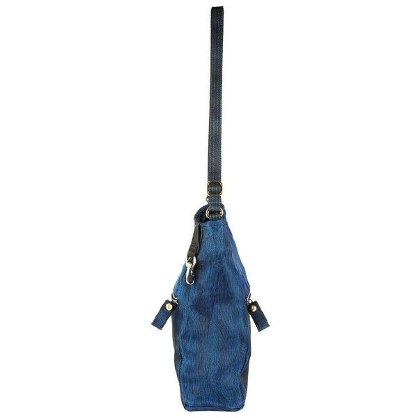 Blue sling bag with a strap on a white background