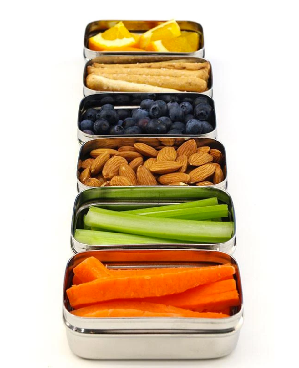 Close-up of open stainless steel mini sauce container showing 5 oz capacity and plastic-free lid