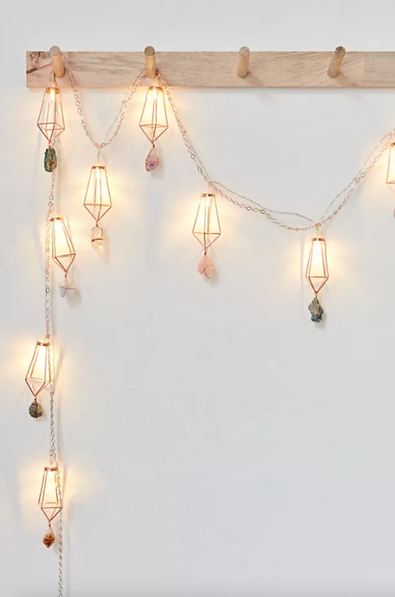 Ariana Ost's Rainbow Crystal Garland - light up your home with healing gems! Quartz, Pyrite, Amethyst & more. LED, geometric decor. Shop now!