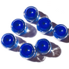 Close-up of SEA Creature blue spirulina tinted lip balm jar by Plant Makeup, showing minimal eco-friendly packaging