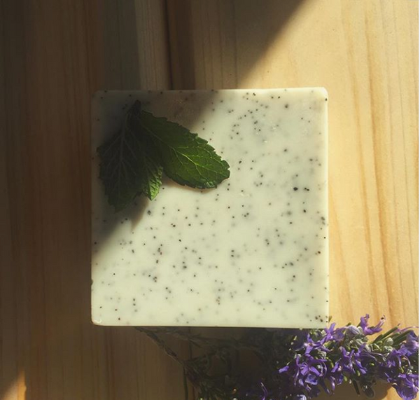 Heliotrope SF exfoliating bath bar ingredient and packaging detail – rosemary mint and chai spice natural soaps