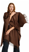 Model wearing the Premium Classic Solid Alpaca Poncho, showing relaxed fit and elegant fringe trim