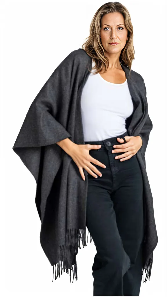 Purely Alpaca Classic Solid Poncho laid flat displaying full 50 x 70 inch dimensions and fringe edges