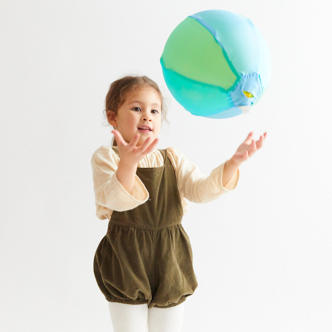 Sarah's Silks Sea Balloon Ball packaged in a lightweight silk gift bag with safety hang tag