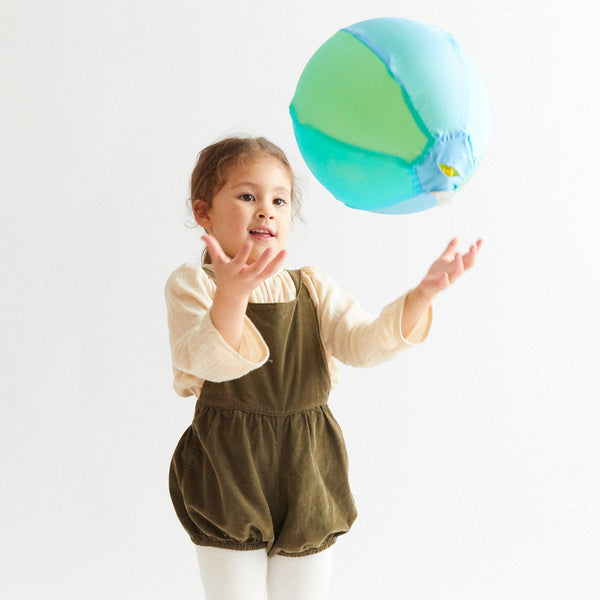 Sarah's Silks Sea Balloon Ball packaged in a lightweight silk gift bag with safety hang tag