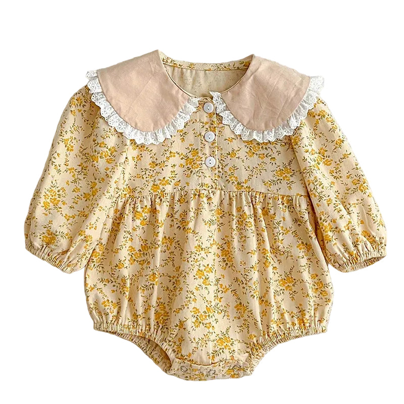 Baby wearing the Paisley Lapel Romper with lapel collar detail