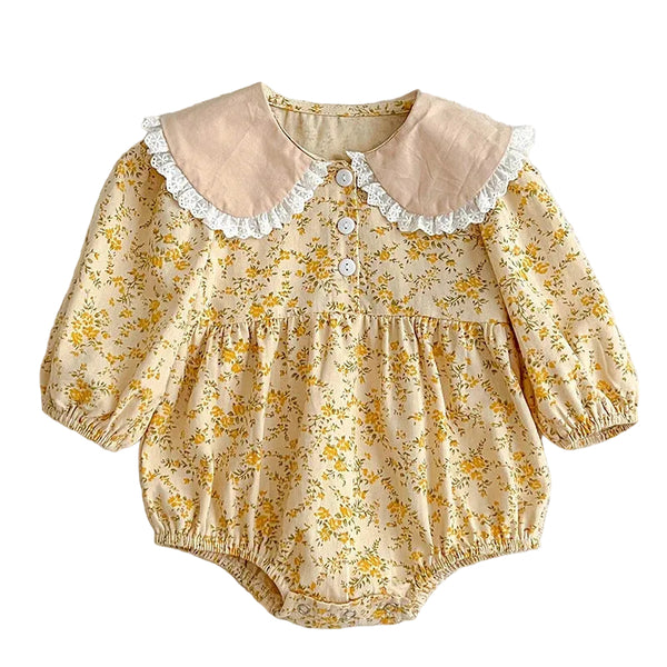 Baby wearing the Paisley Lapel Romper with lapel collar detail
