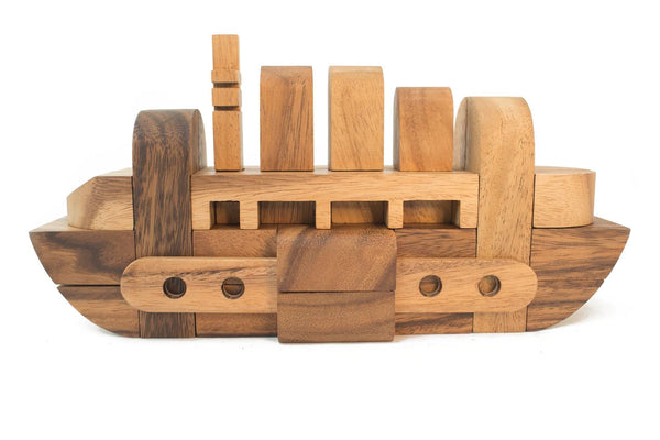 Wooden boat puzzle on a white background