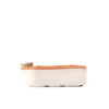 Rectangular basket with a cork lid on a white background