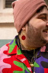 Fair Anita maroon and gold Minnesota pride bone earrings made from upcycled animal bone and recycled brass