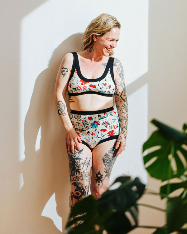 Front view of Sky Rise Inked Up high-rise underwear featuring whimsical tattoo-style characters
