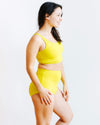 Close-up of Thunderpants Sky Rise Star Fruit underwear showing bold yellow chartreuse colour