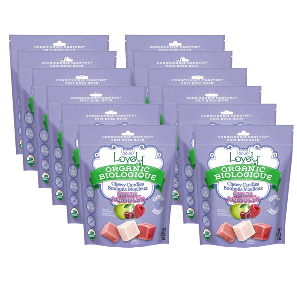 Multiple packages of Loved Organic Biologique chewy candies on a white background