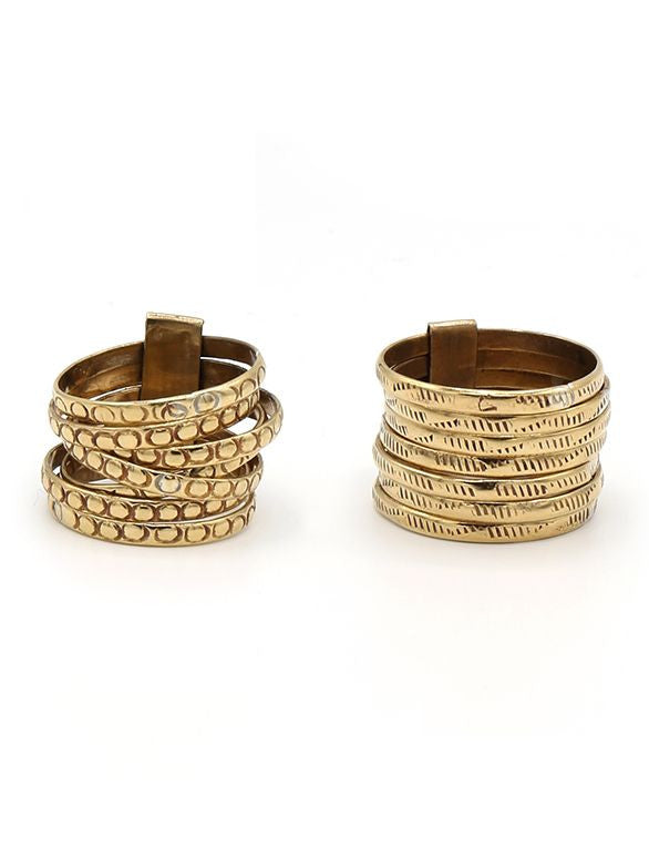 Stacked Armor Statement Ring set in recycled brass by Fair Anita, shown stacked together on a hand