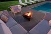 Outdoor seating area with a fire pit by a pool