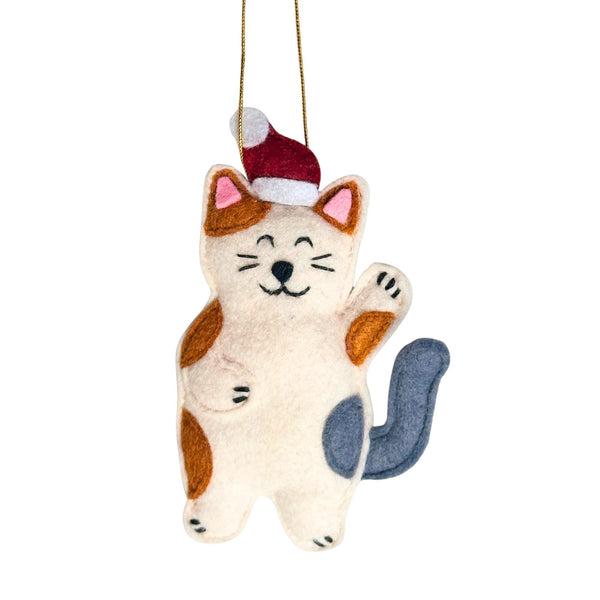 Stealing Santa Hat Cat Ornament hanging with fabric loop on holiday tree