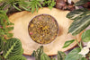 Herbal steam facial blend with scooping spoon and sachet bag included, shown with packaging
